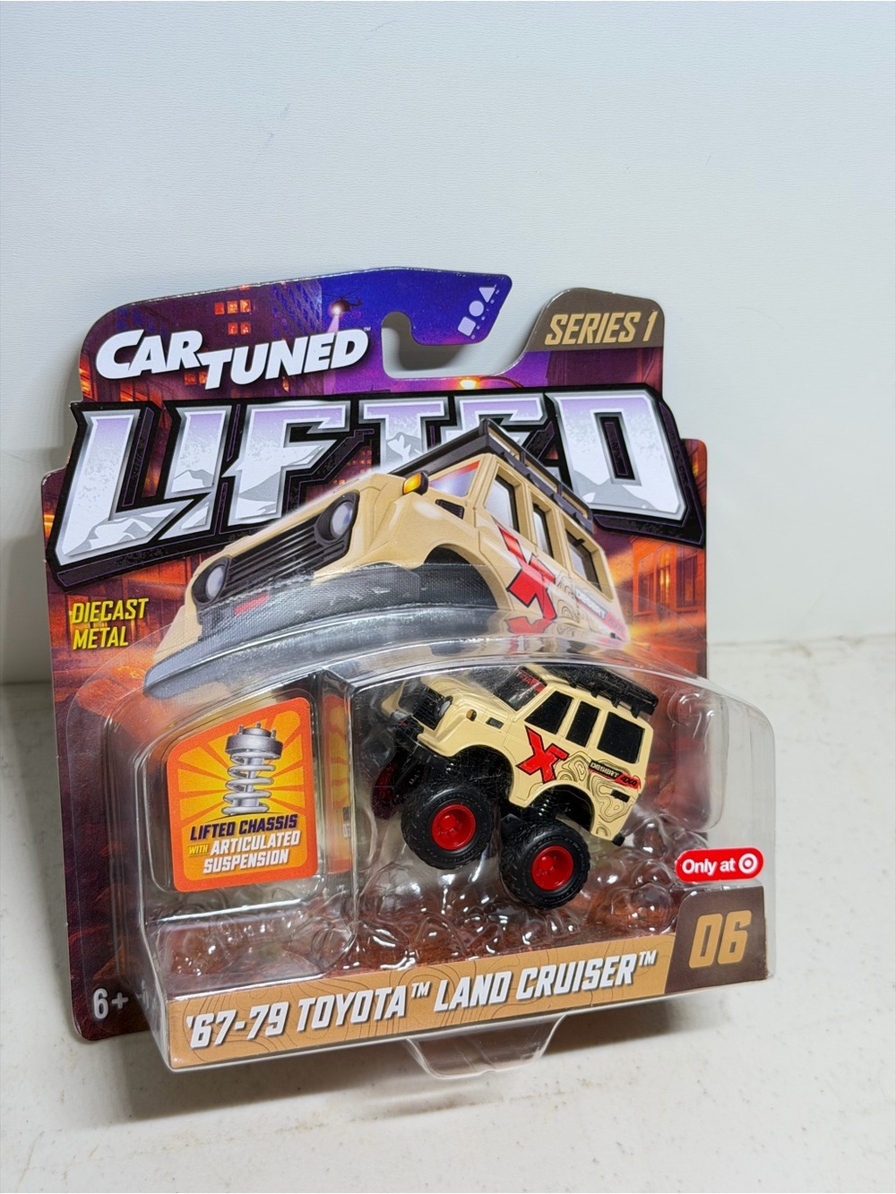 Lifted '67-'79 Toyota Land Cruiser Diecast Toy - Beige with Red Accents